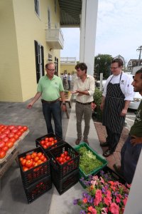 Secretary Douglas Fisher checks out the daily delivery of fresh produce to Blue Pig Tavern that was just picked from Beach Plum Farm