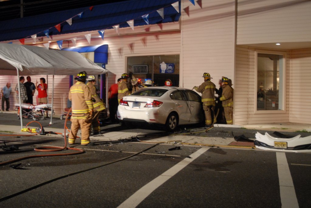 Crash Into Building Injures Driver