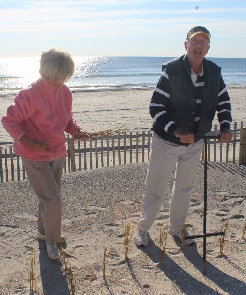 Mr. and Mrs. Robin Mackintosh plant dune grass.