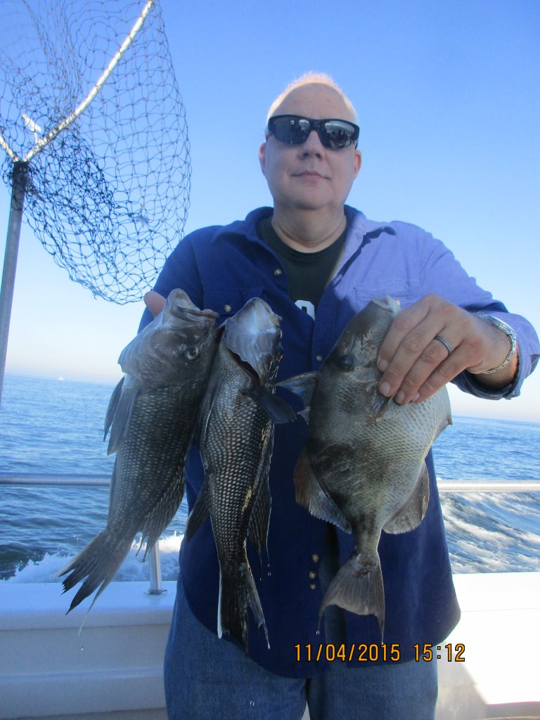 Adam Perlman and his 2.5 pound trigger fish. 