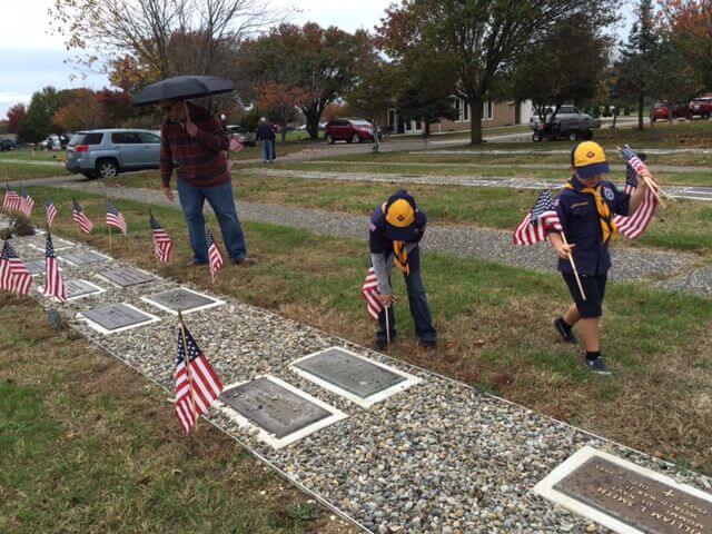 PHOTOS: Cub Scout Pack Prepares Cemetery for Veterans' Day