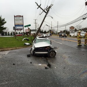 Crash Into Pole Injures Driver