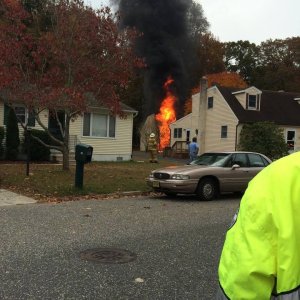 Firefighters Battle Garage Fire