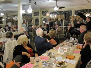 MC James Rana creating a balloon heart for ELTC costumer Marion Brady at ELTC’s recent gala