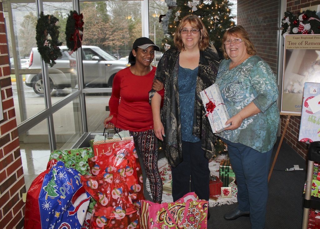 Program Director Deborah Brasch (center) is pictured with Lataysha Sherreta