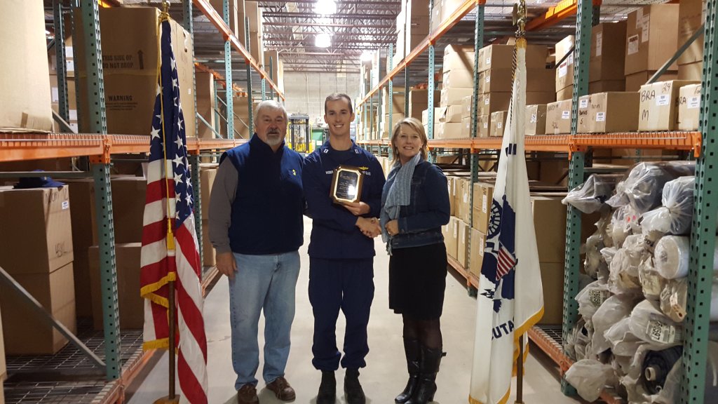 Cape May County Chamber of Commerce Chamber President Vicki Clark presents Honorary Membership Plaque to the Uniform Distribution Center Manager Lt. Bryan Weber