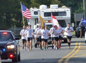 Military runners approach Sandman Consolidated School