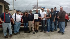 Members of Wolf Creek Fire District accept the Ford F-350 from Station 18 Members in Tennessee.