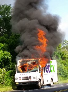 Firefighters Extinguish Truck Fire