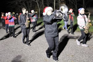 Dennis Township School band marches and spreads holiday music.  