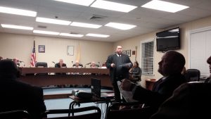 Architect Patrick Gallagher explains March 8 referendum facing Middle Township School District voters. Board President Dennis Roberts sits in foreground; Superintendent Dr. David Salvo and other board members are in background.
