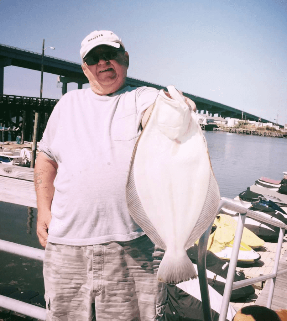 Bill Roverano and his 24 inch fluke. 