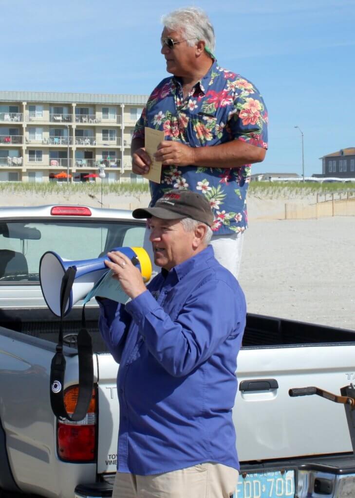 City Council President Bill Kehner (front) and Sea Isle City Beach Patrol alumni Joe LaRosa were among those who shared words of praise for the Bowen brothers on July 11.