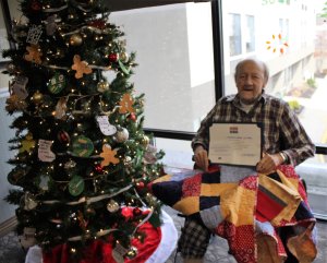 George Kerns with his Quilt of Valor for service in the Army. 