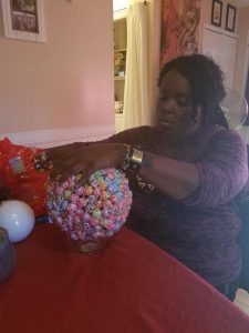 Ernestine Williams is creating Dum Dum lollipop trees for police officers working Thanksgiving Day to show appreciation for their efforts.