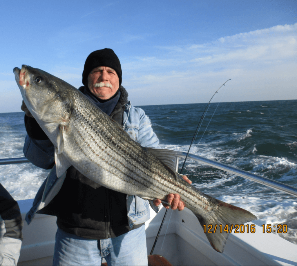 Frank Servocky and his 20-pound striper.