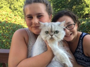 Snowball pictured with the Heary family. She was lost in Lower Township and returned to her family with the help of social media.