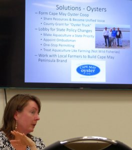 Planning Director Leslie Gimeno speaks with Coalition of Civic Associations (COCA) regarding oyster farming.