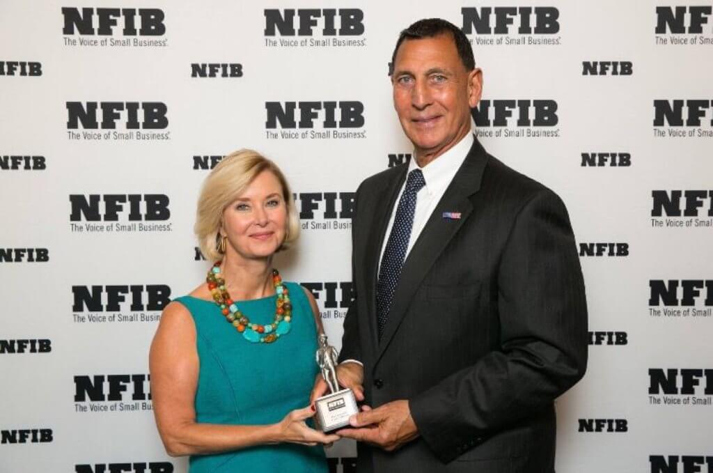 Congressman LoBiondo receiving the “Guardian of Small Business” award from NFIB President Juanita Duggan.