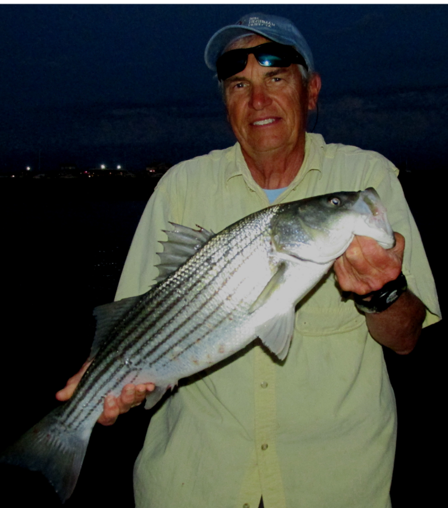 Captain Ray and his nice striper. 