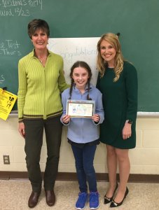 Dennis Township winner Caitlyn McGurk holds her card alongside her homeroom teacher Ms. Lisa Pettit and Cooper Levenson attorney Kelli Prinz. 