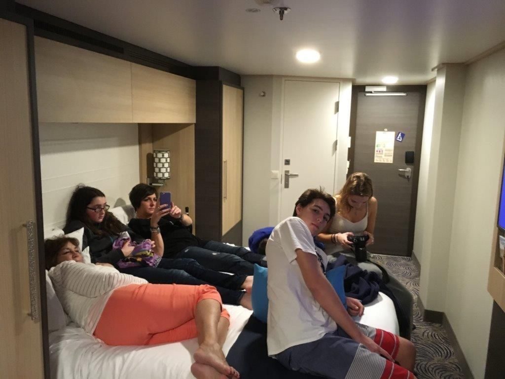 Dennis Crowley's daughter and her children hunker down in one of two cabins the family shared. The ship never lost its satellite signal amid rough seas.