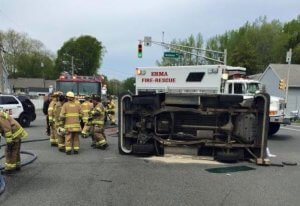 Postal Worker Freed from Overturned Truck