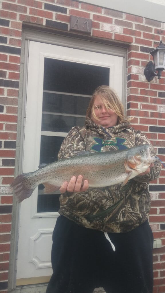 Christopher Hackett and his trout.