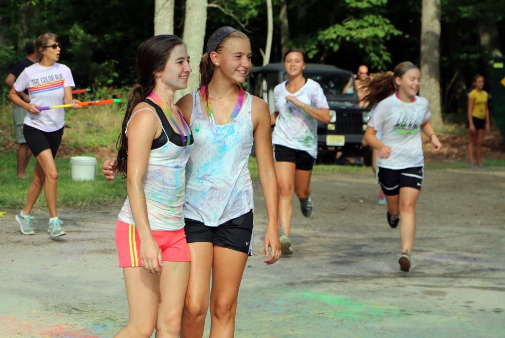 Maysen Gibboni and Alexa DiPalantino are full of color as they complete the first 4-H Color Fun Run at the 2015 Cape May County 4-H Fair. This year