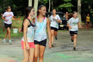 Maysen Gibboni and Alexa DiPalantino are full of color as they complete the first 4-H Color Fun Run at the 2015 Cape May County 4-H Fair. This year