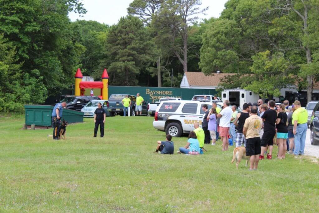 Families watch a K-9 demonstration from the Cape May County Sheriff’s Department.