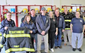 Members of the Strathmere Fire Company show off their new gear after donating old uniforms and equipment to needed companies in North Carolina. Left to Right: Bruce Riordan