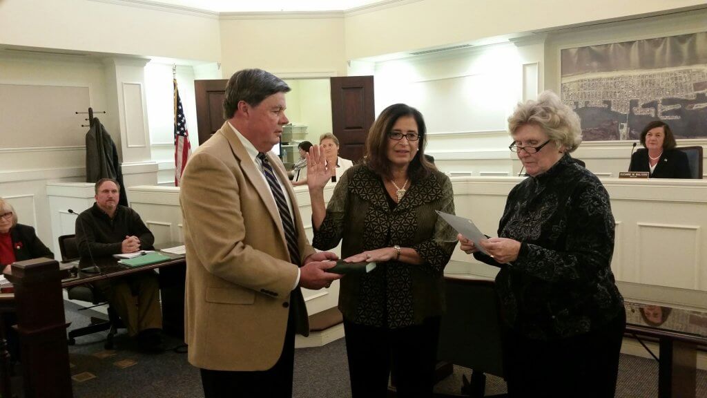 Mantura Gallagher takes oath Jan. 5 as member of Borough Council with her husband James and Clerk Suzanne Stanford. She was chosen to fill the vacancy that resulted from the death of Albert Carusi.