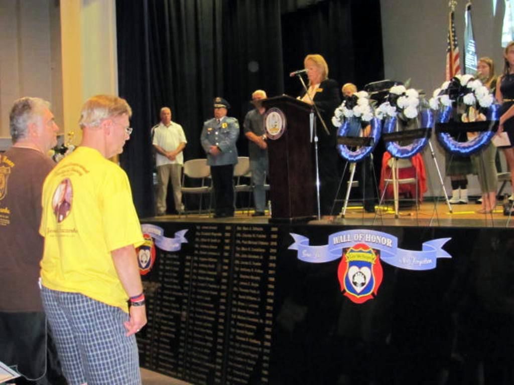 Freeholder E. Marie Hayes leads the memorial service remembering those who have lost their lives in the line of duty.