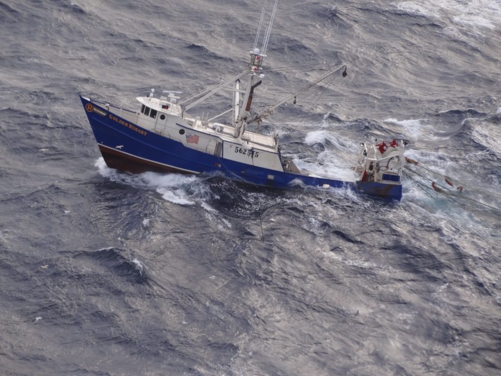 The Coast Guard assists a fishing boat taking on water 80 miles east of Cape May Jan. 13. The crew of the 77-foot fishing boat Golden Nugget used an electronic position-indicating radio beacon (EPIRB) to report their distress. 