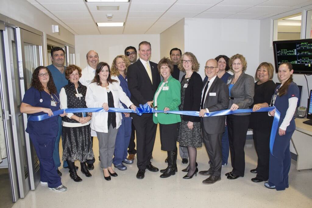 Middle Township Mayor Michael Clark cuts the ribbon on Cape Regional’s Advanced ICU Program.Front L to R: Kathy Wright