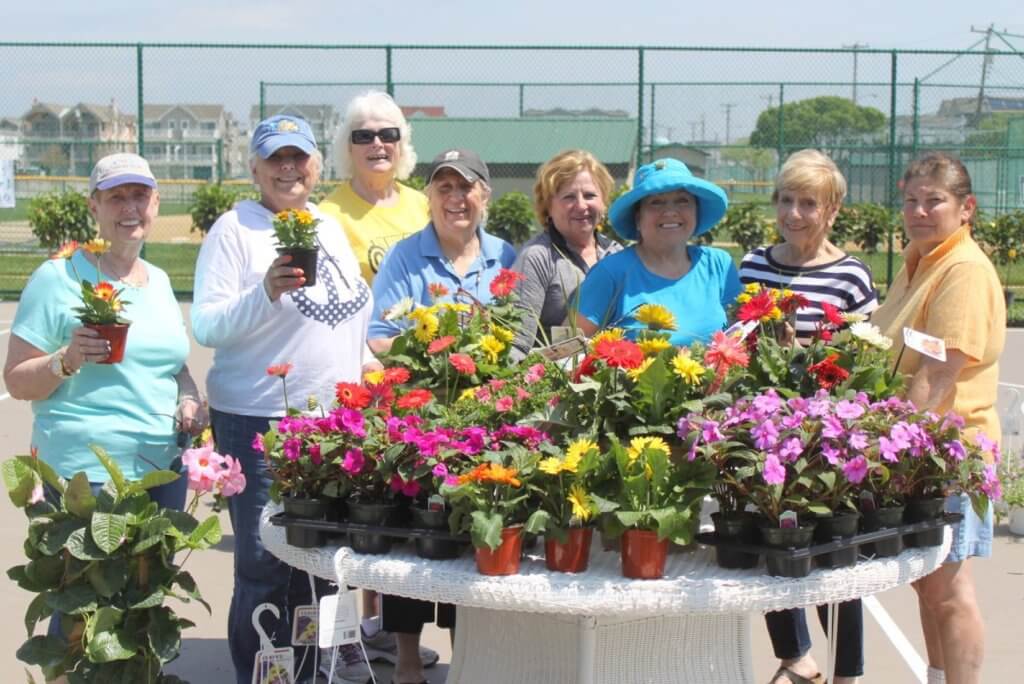 The members of Sea Isle City’s Garden Club hosted their annual Flower Sale fundraiser on May 14 and 15. Proceeds from the event benefit the Garden Club’s charitable efforts. Shown during the sale are Garden Club members (from left) Mary Tighe