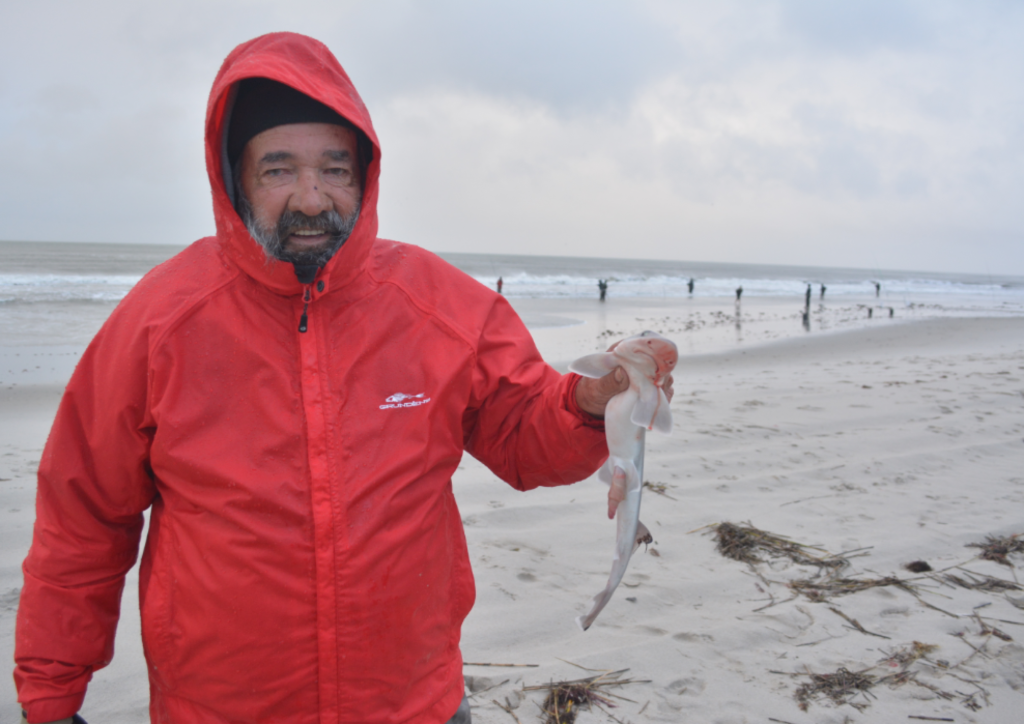 Walt Stanton and his shark caught at the Ocean City Fishing Club Tournament. 