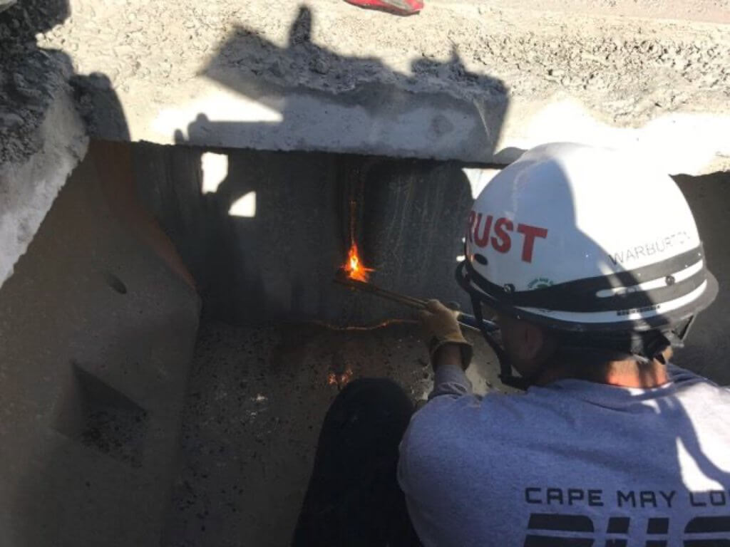 Cutting through a steel plate to access victim number two.