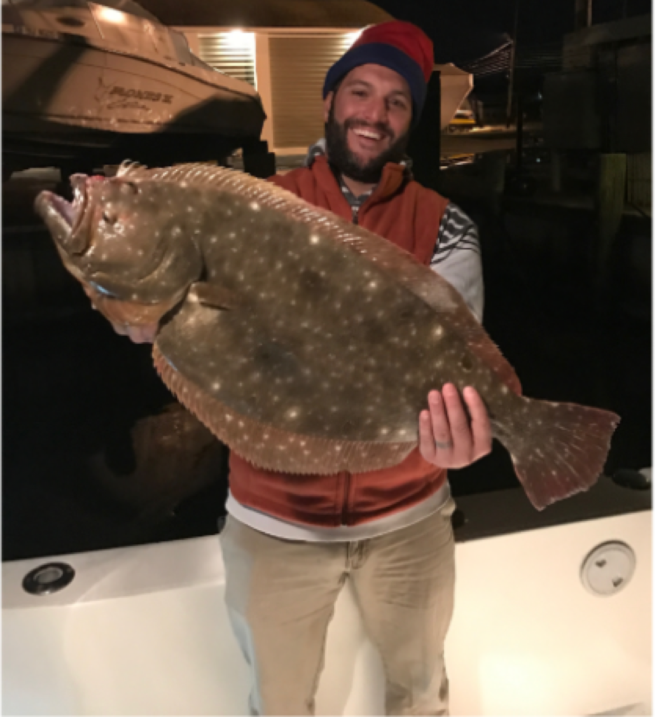 Nicholas Smith with an out-of-season 31 inch flounder. 