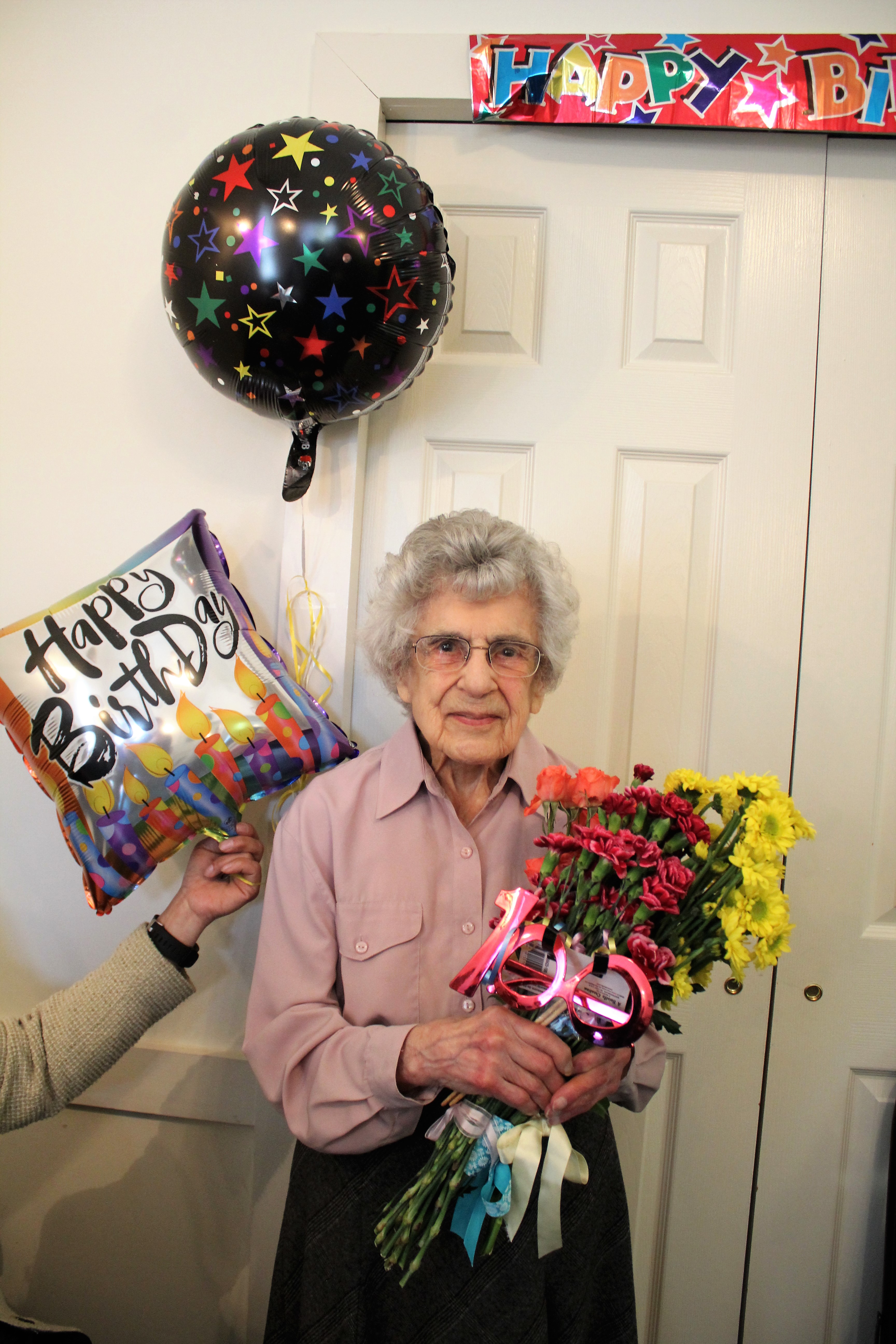 Centenarian Eleanor Fabiano beams at her birthday celebration at St. Elizabeth's Church March 19. Fabiano celebrates her 100th birthday March 25.