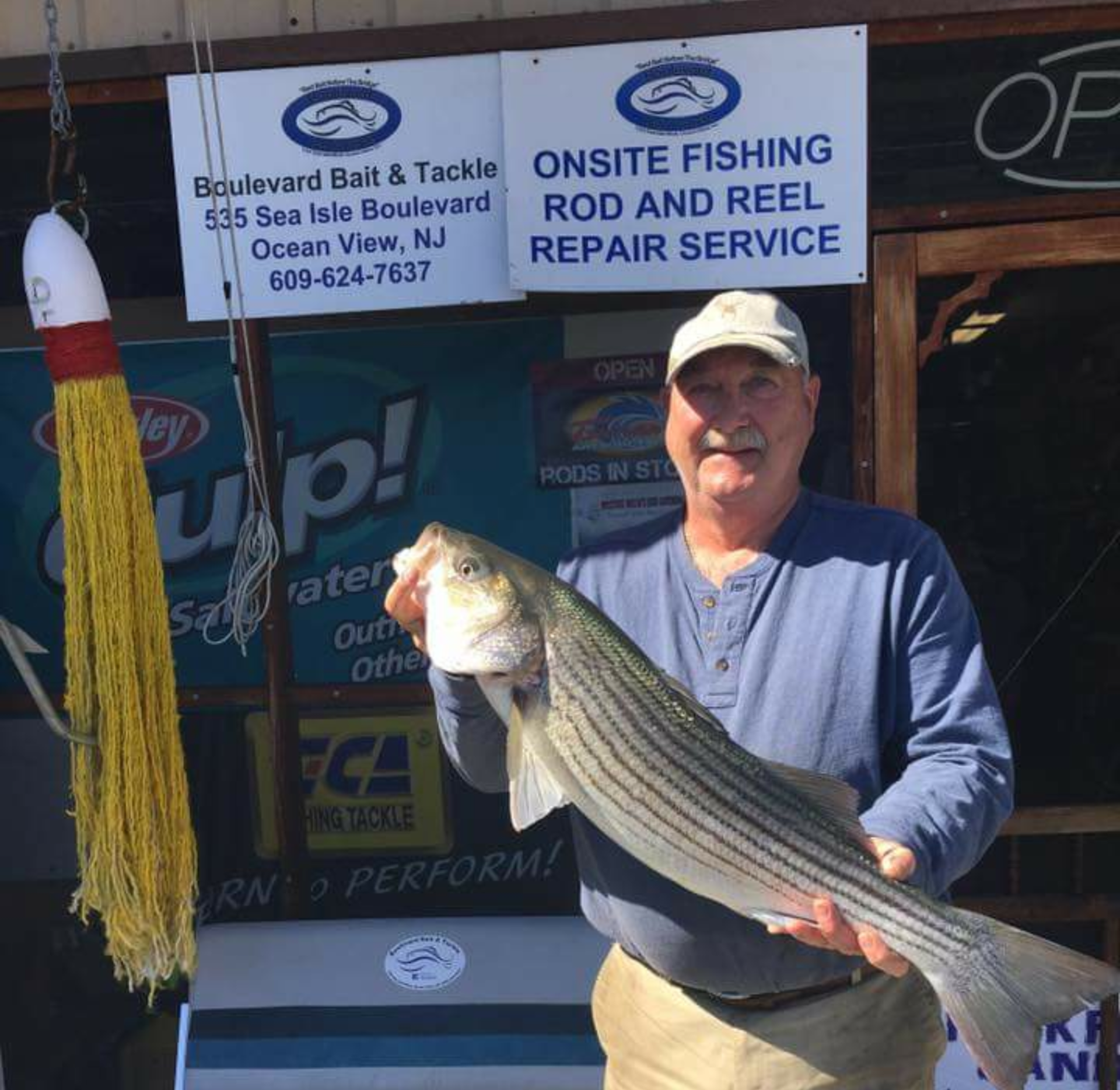 Clay and his 30-inch striper.