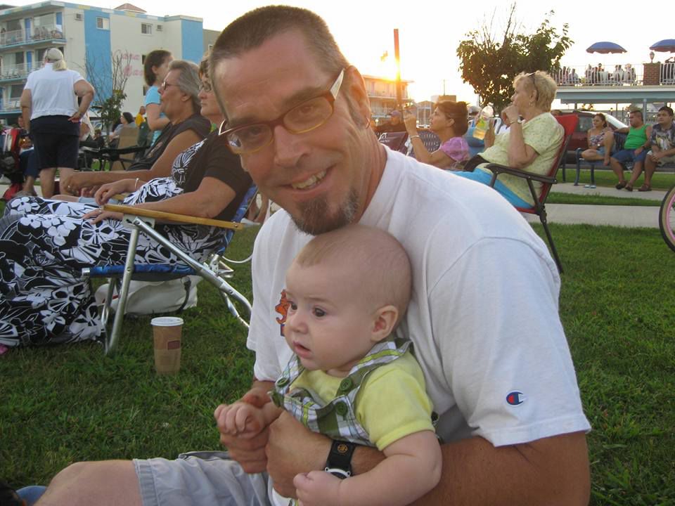 Brendan McBride holds his son when he was a baby