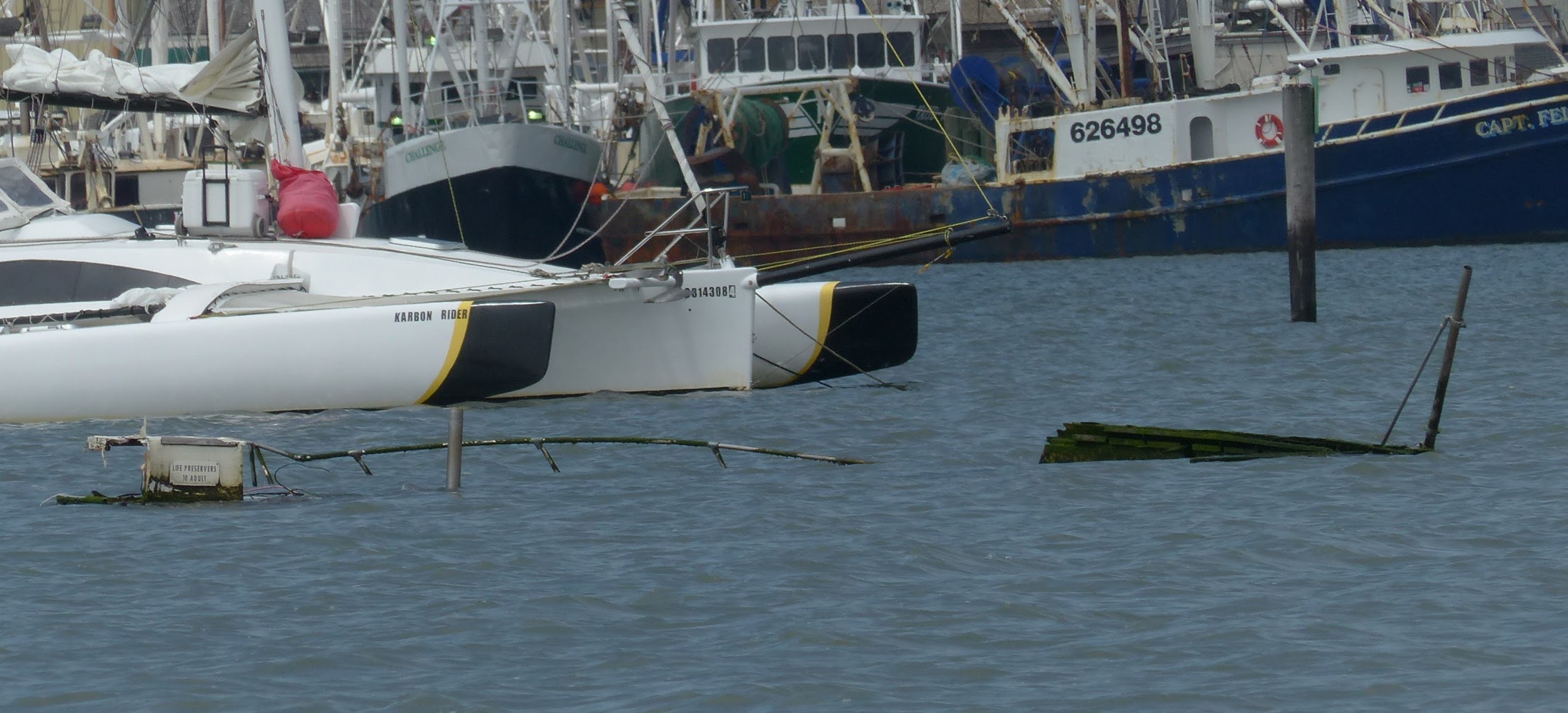 Partially-visible abandoned boat in Cape May Harbor was the focus of citizens' questions at a recent City Council meeting. 