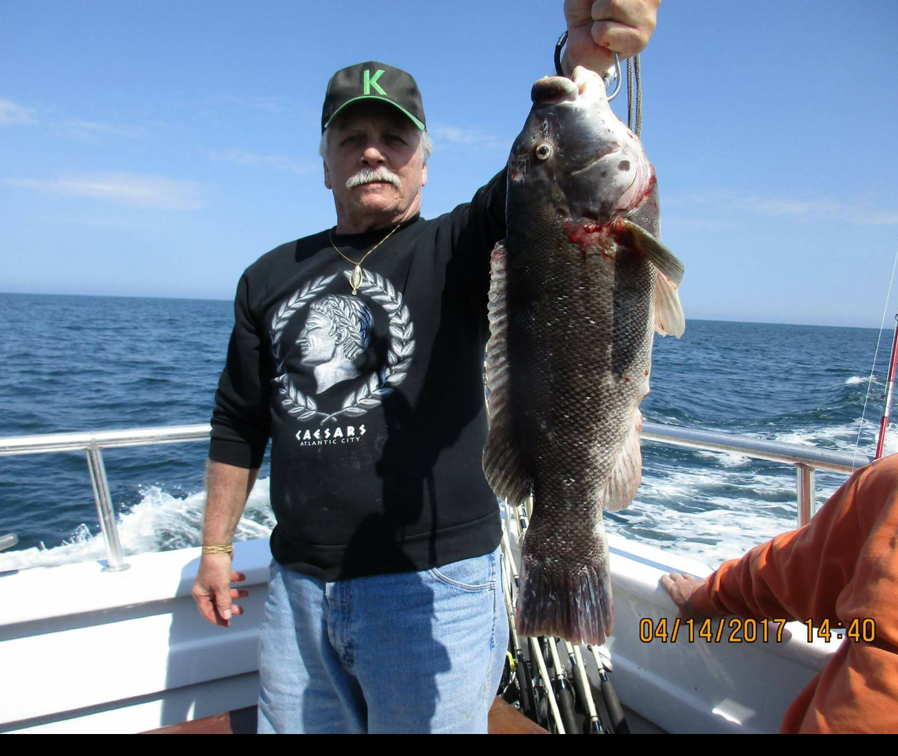 Frank Servocky and his pool-winning 6.5-pound blackfish. 