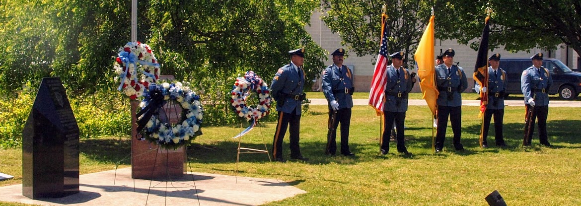 The Cape May County Sheriff's Department Color Guard stands by the Law Enforcement Memorial May 10