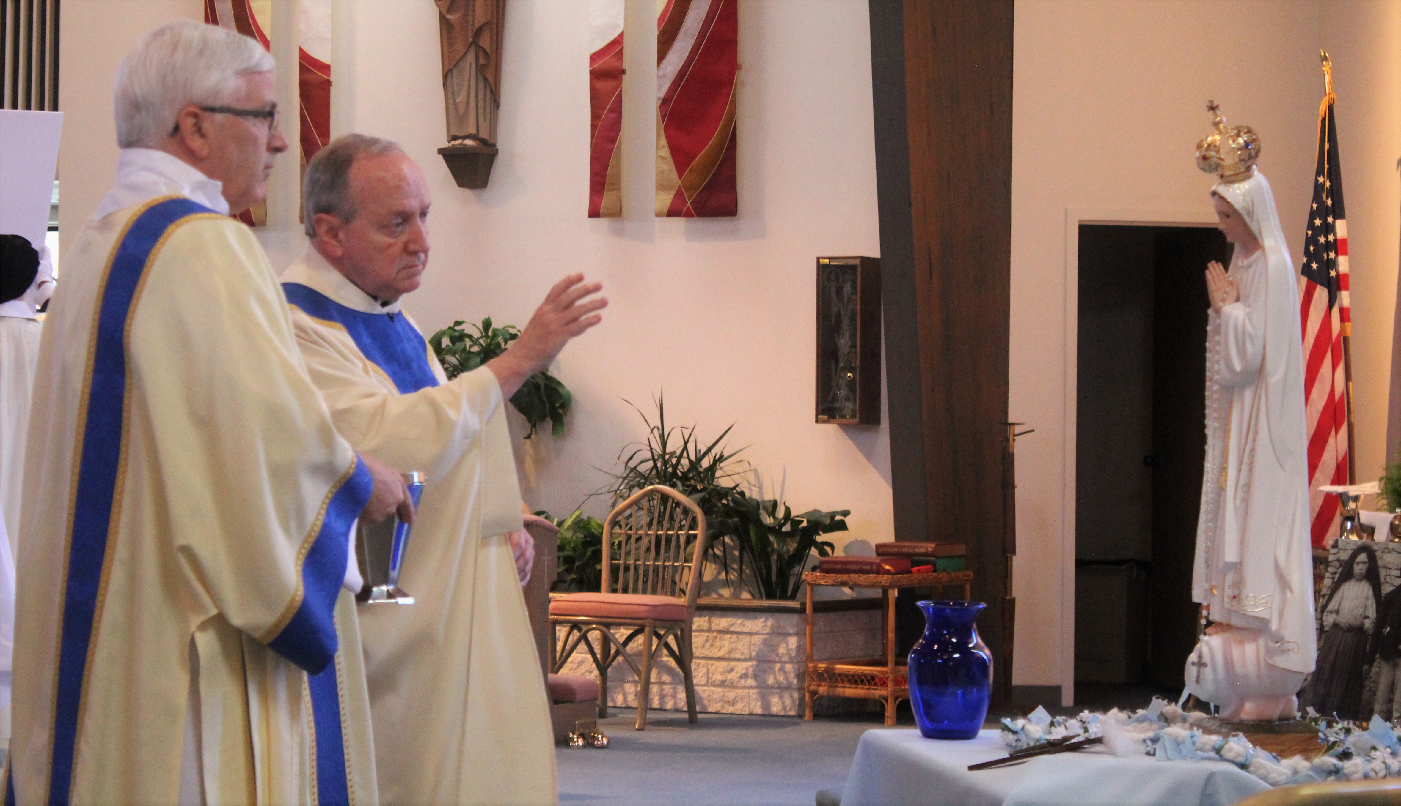 Lady Fatima Statue is blessed during celebration at Maris Stella Church in Avalon May 13.