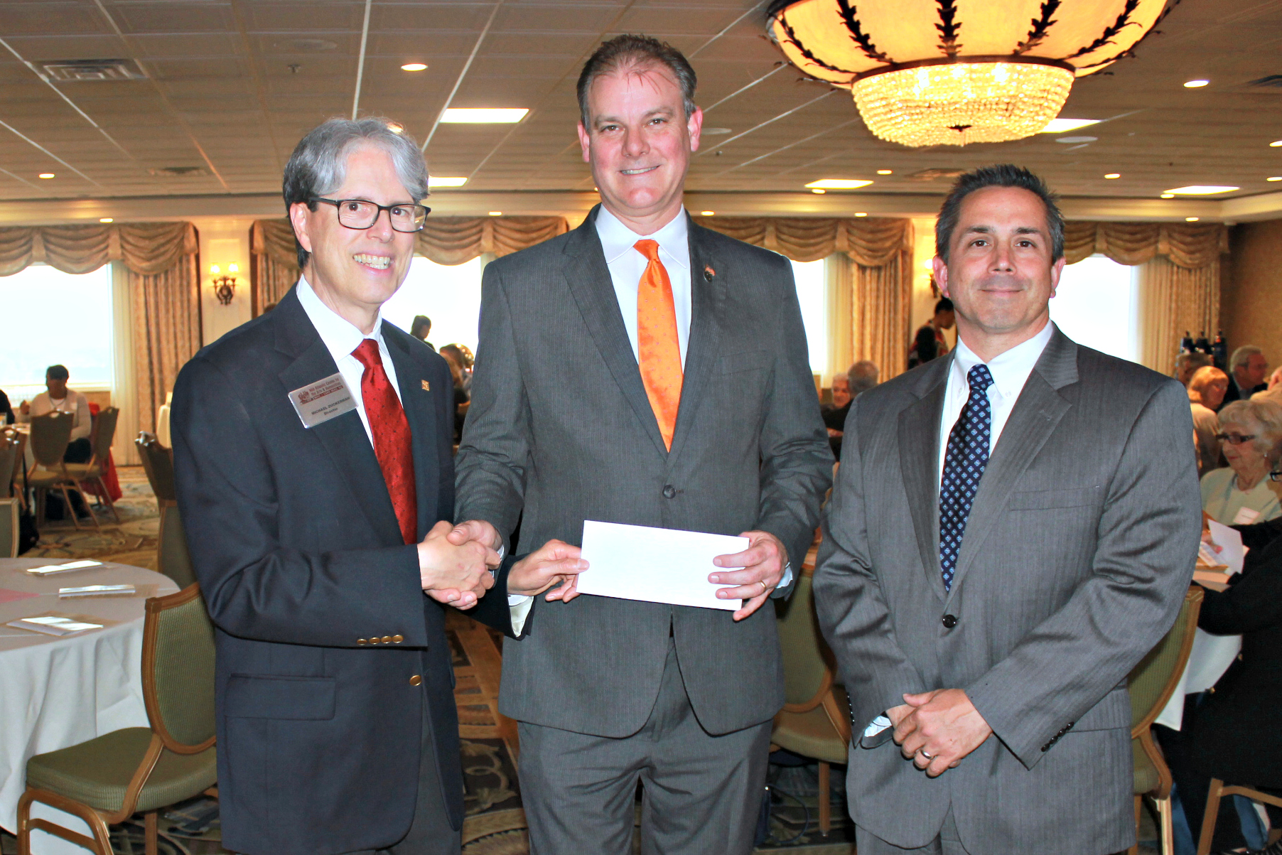 From left: Mid-Atlantic Center for the Arts & Humanities (MAC) Executive Director Michael Zuckerman accepts Sturdy Savings Bank’s annual donation from Cape May Branch Manager Michael Clark and Sturdy Financial Services Adviser and MAC President Christopher Shoemaker.