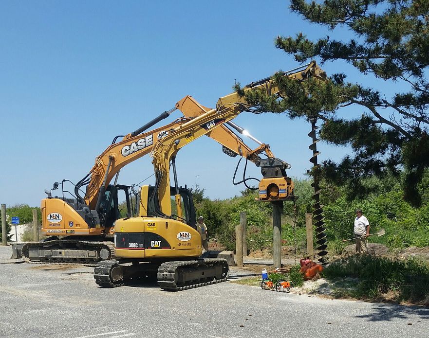 Contractor drives piling for Cape May house.