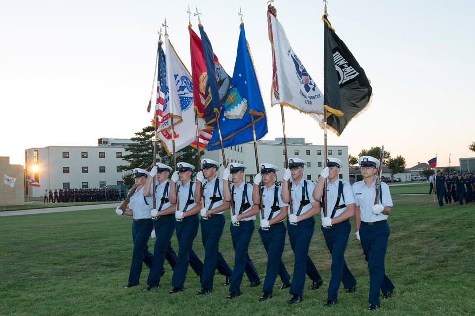 commanding officer of Training Center Cape May return salutes of company commander.